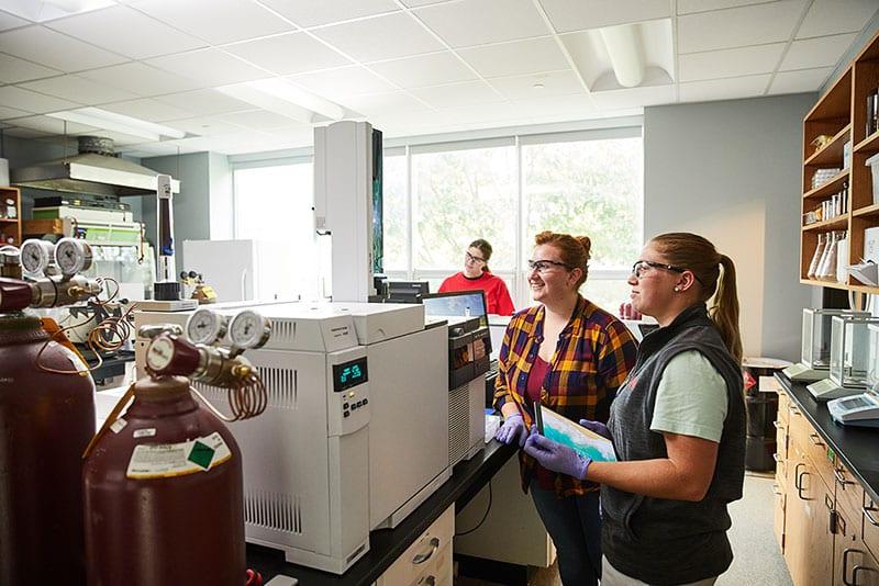 students working in a forensic science lab